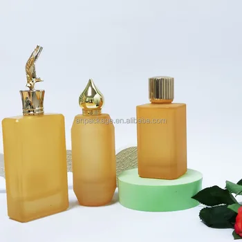 High Grade Arabic Style Custom-made Heavy Base Irregular Crimp mouth 100ml Glass Perfume Spray Bottle With Luxury Metal Gold Cap