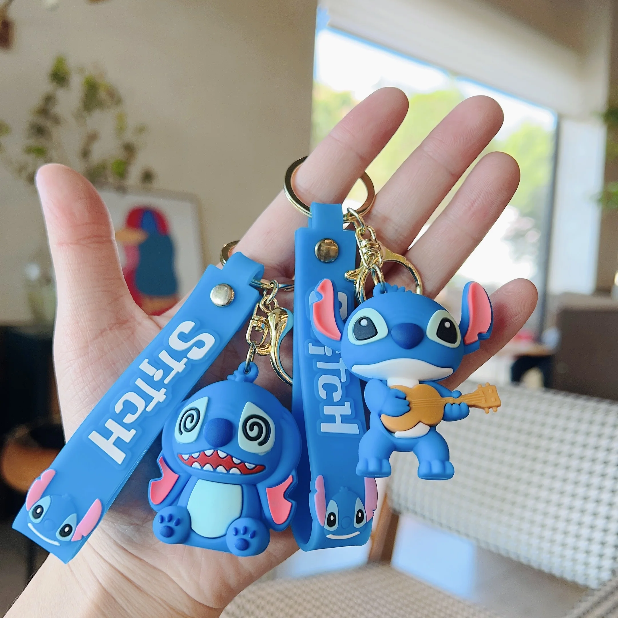 Factory wholesale 3D pvc cartoon key chain Funny Stitch keyring bag accessories skateboard pendant Cute Stitch keychain