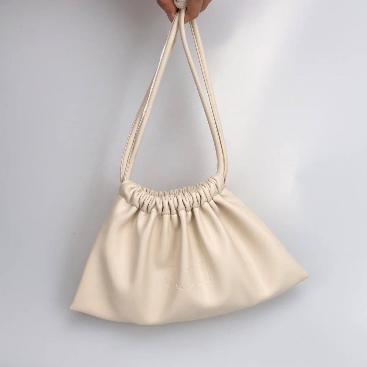 Customized Emboss Leather Cosmetic Gift Drawstring Bag Cream Leather Travel Shopping Gift Jewelry Dust Makeup Pouch