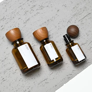 Custom Round Empty Amber Fragrance Glass Perfume Bottle 30ml 50ml 100ml Perfume Spray Glass Bottles With Wooden Cap