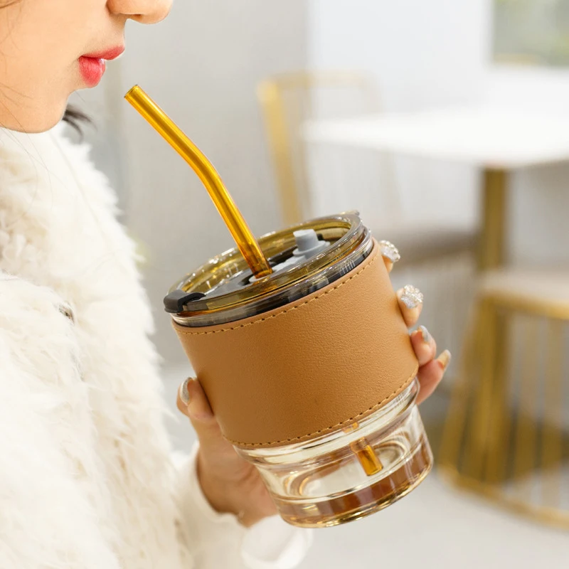 2023 Elegant PU Leather Sleeve reusable glass cup with lids and straw  glass coffee mug