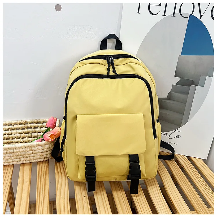 Wholesale solid color backpack simple waterproof lightweight student bag unisex suitable for travel fitness sports outdoor