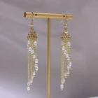 China China Quality Manufacturer Palace Style Hollow Wind Chime Natural Freshwater Pearl Jewelry Earrings Gold-plated