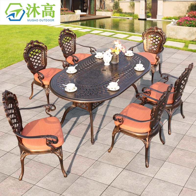 wrought iron table and 8 chairs