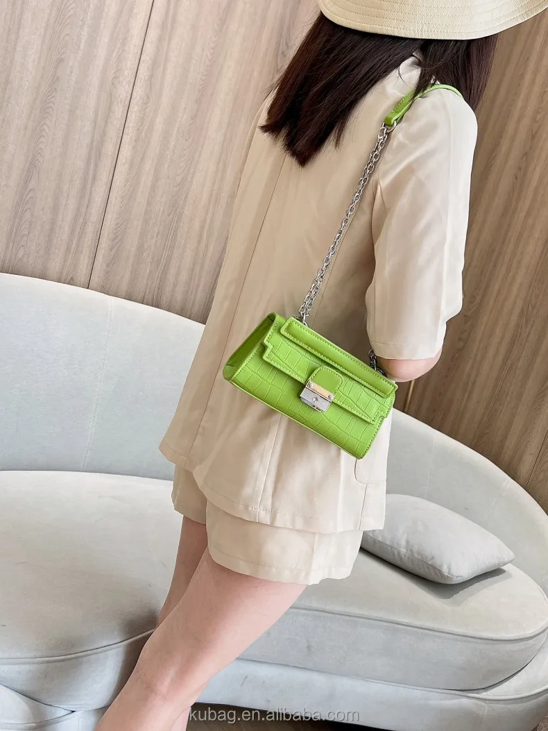 alligator embossed handbag