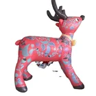 Red inflatable deer adorn giant inflatable Christmas deer