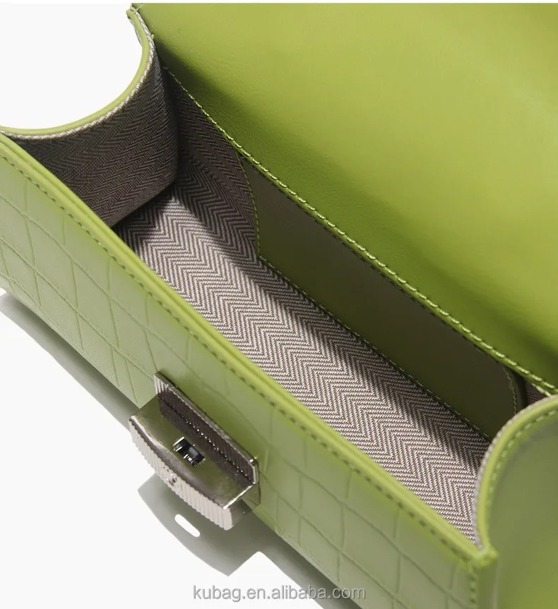 alligator embossed handbag