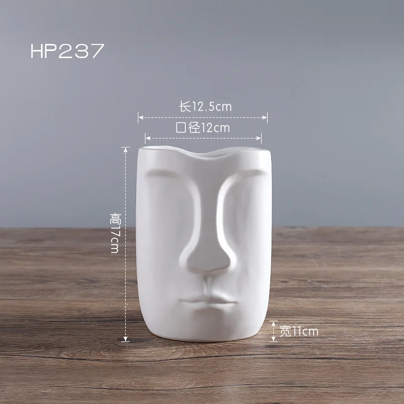 2023 Hot sell Home decor Living room items Craft ornament Porcelain Abstract human face wide mouth Ceramic flower vases