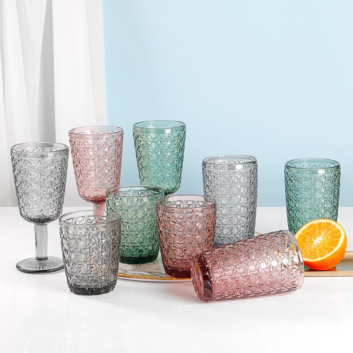 Fashion design hot selling wine juice beer glass cups embossed pattern wholesales drinking glass cups