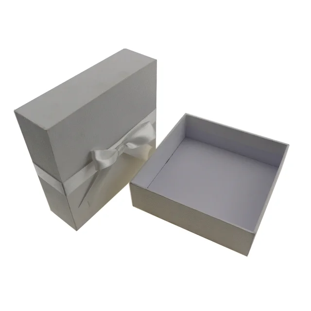 white packaging cardboard base and lid gift box with ribbon