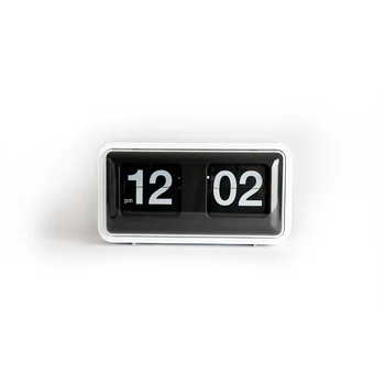 Miaoke clear box page clock living room cat eye retro pure black pure white table clock gift clock