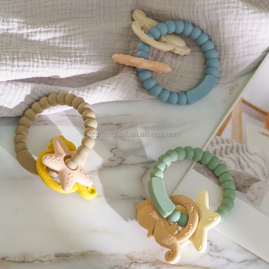 product cartoon shaped food grade bpa free custom silicone baby teether soft toy pacifier ring unisex customized teething aids-4