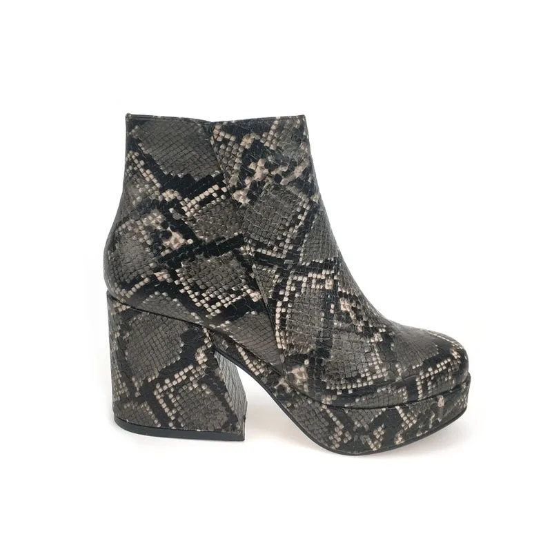 snakeskin wedge booties