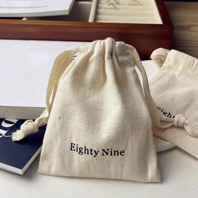 Beige Calico Canvas Dust Bag Small Gifts Pouch with Custom Logo Printing Drawstring Closure for Daily Travel Outdoor Use factory