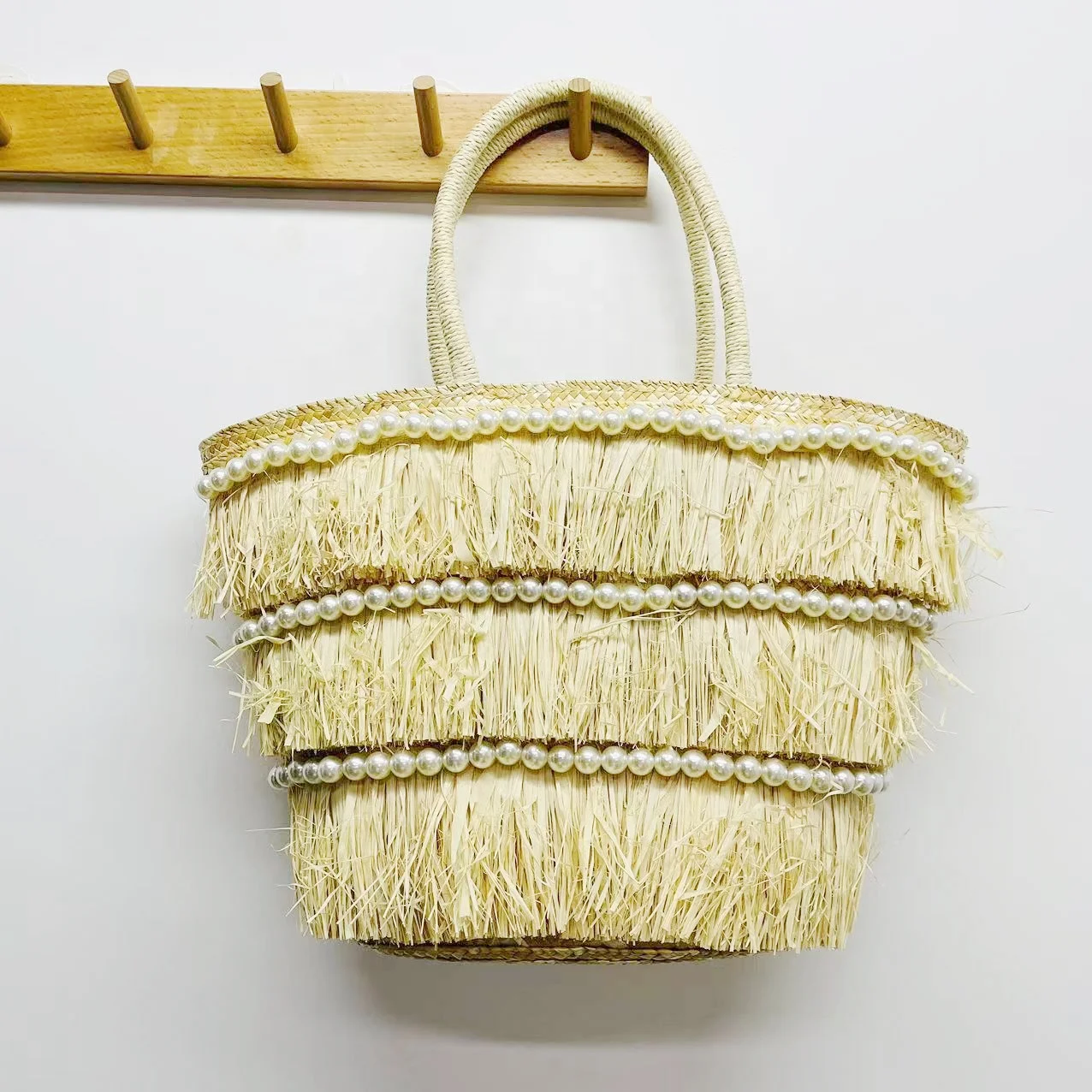 HUAYI 2024 wholesale custom woven women pearl straw paper summer basket bag beach large tote handbag with pearls