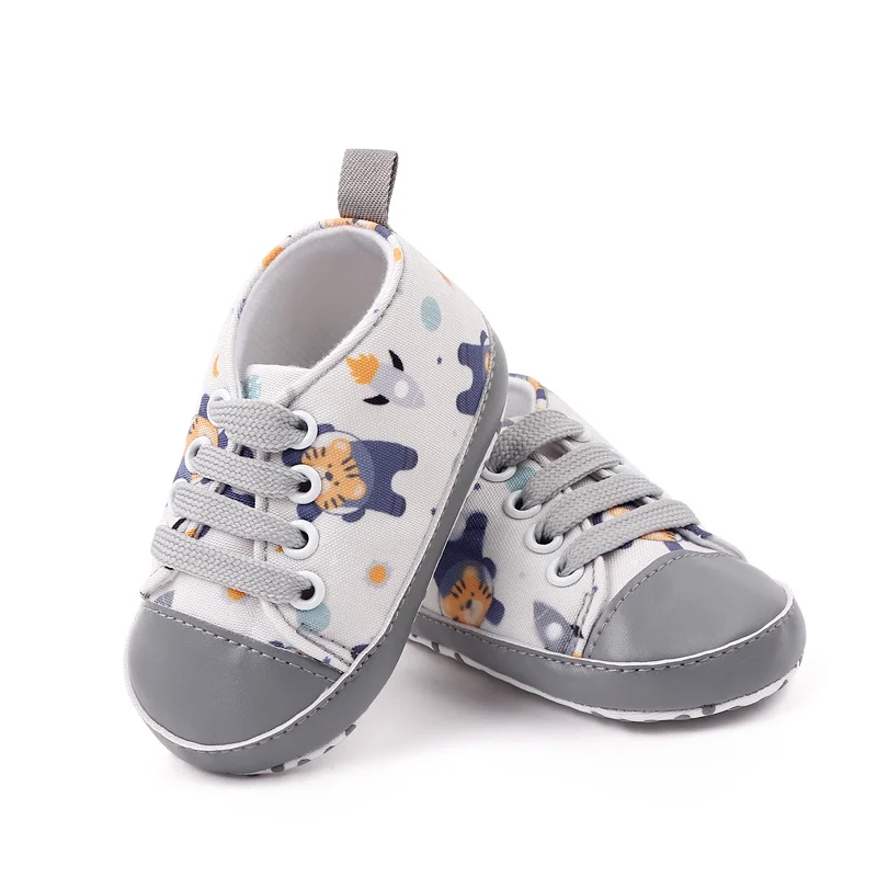 Hot selling high quality cheap canvas baby toddler newborn infant shoes sneakers unisex supplier