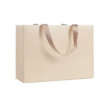 Custom With Your Own Logo Luxury Reusable Beige Paper Shopping Bags With Ribbon Handle For Clothing Shoes