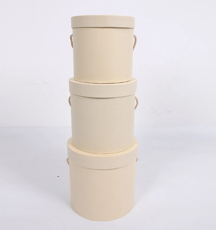 round hat box with handle