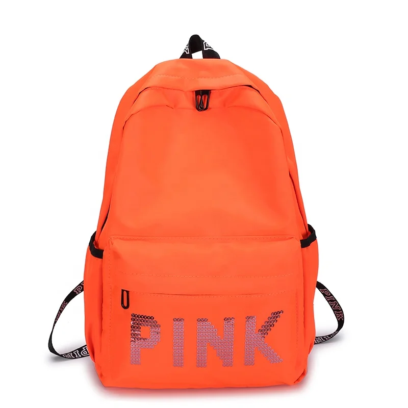 pink backpack with laptop compartment