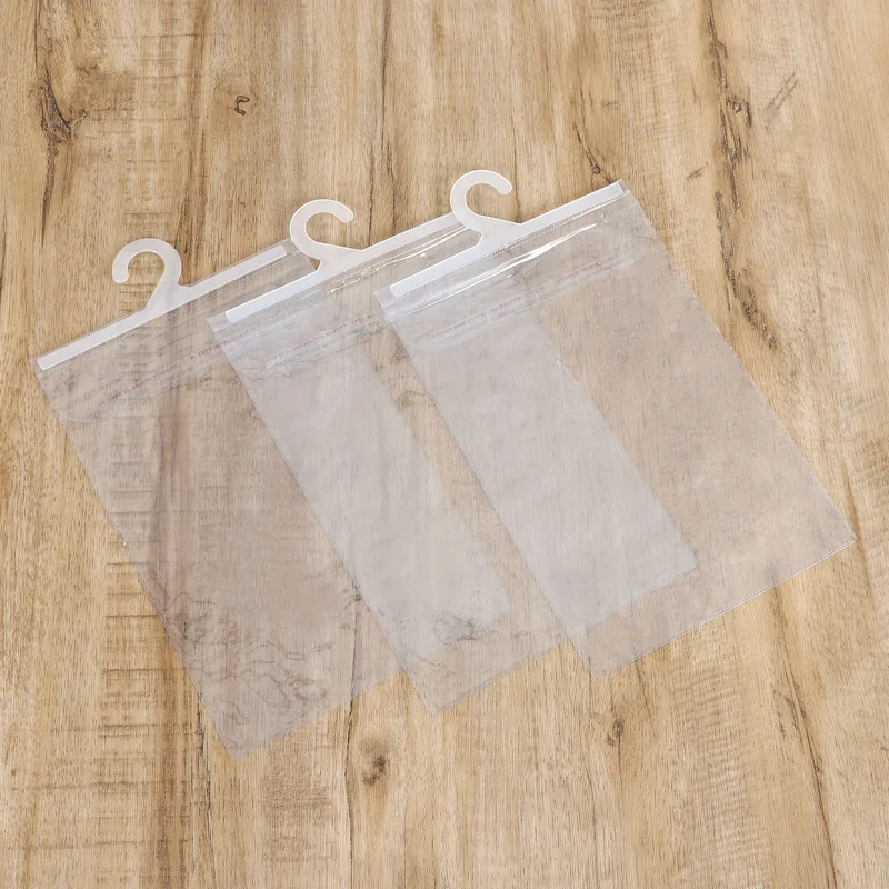 Wholesale Pvc Plastic Packaging Bag Snap Pvc/PE Packaging Bag with Plastic Hanger Hook Bag 1