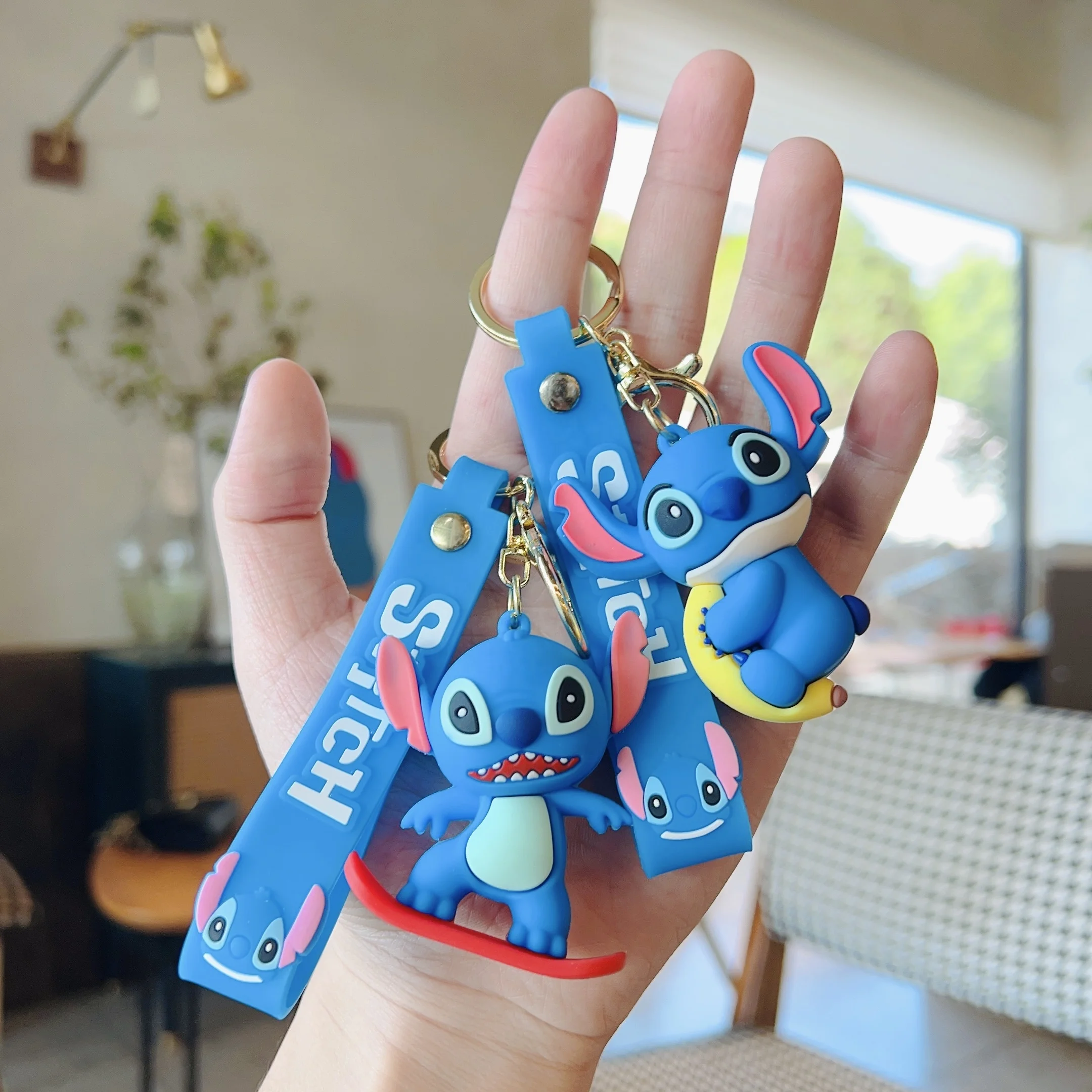 Factory wholesale 3D pvc cartoon key chain Funny Stitch keyring bag accessories skateboard pendant Cute Stitch keychain