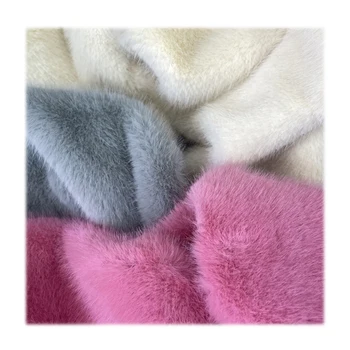 Fancy soft comfortable no hair loss low pile solid faux minky fur fabric wholesale for garment