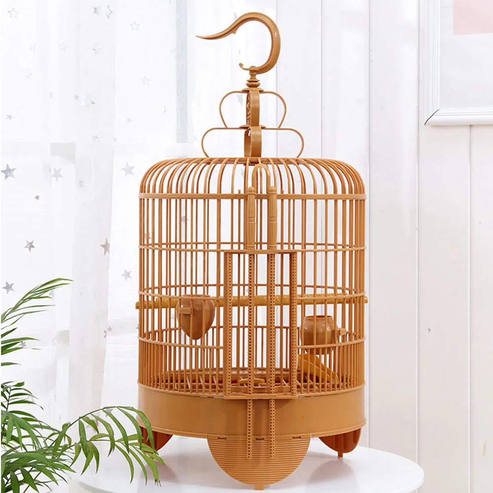 Plastic bird cage in brown colour