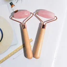 2022 New Design Wooden Handle Facial Massager Skin Lifting Pink Rose Quartz Face Roller