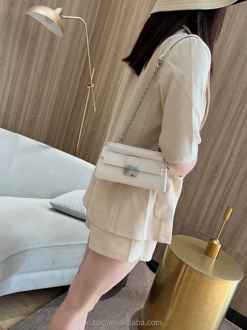 alligator embossed handbag