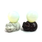 Wholesale Crystal Sphere Holder Black And White Pig Crystal Ball Stands