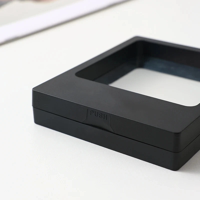 Clear visibility in floating frame jewelry display Side view of transparent jewelry box showing depth and clarity