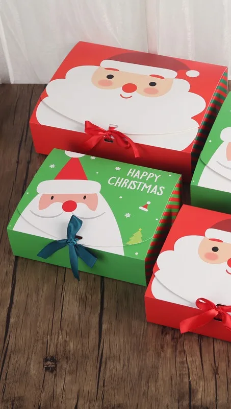 christmas eve apple gift box with ribbon and bell