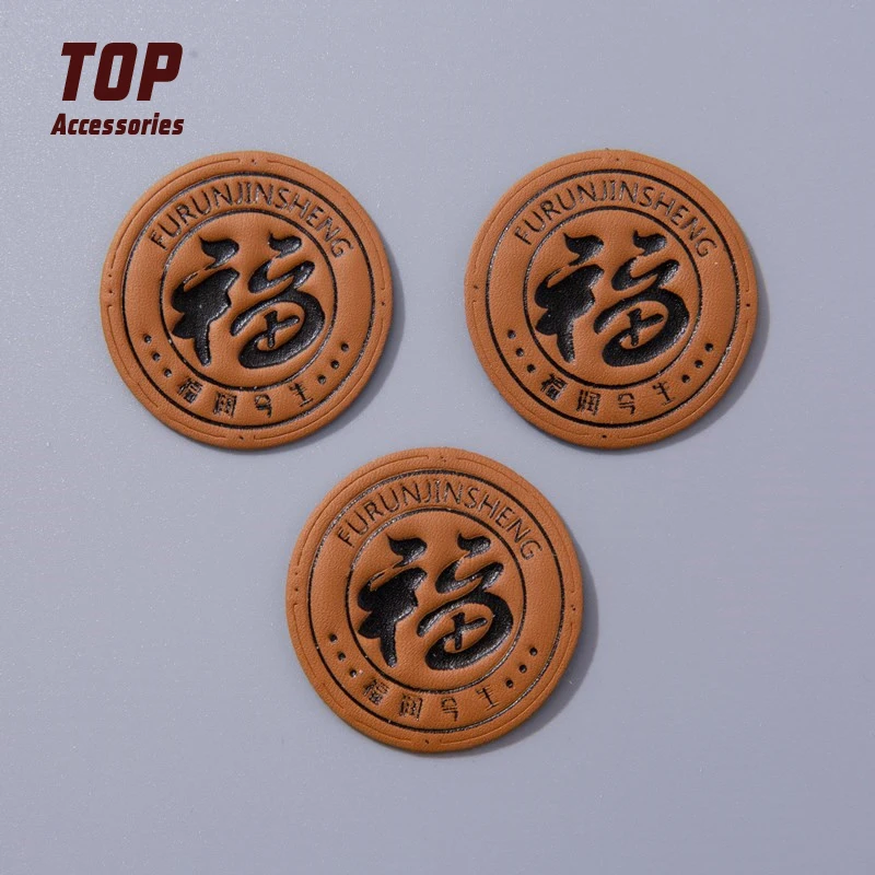 Circular Embossed PU Leather Jeans with Brand Logo for Jacket Garment Accessories