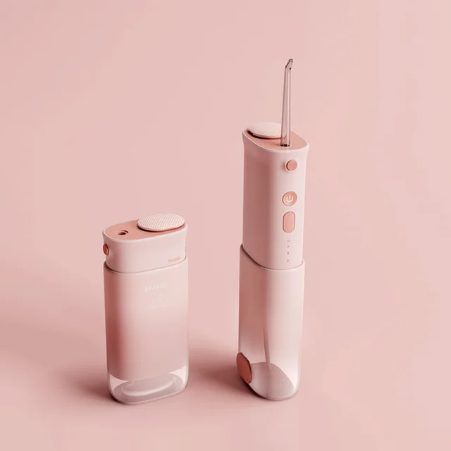 High Quality Oral Care Appliances OEM mini Portable Oral Irrigator pink Water Flosser for teeth cleaning Cordless