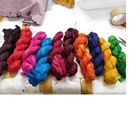 multii colored sari silk ribbon yarns made from recycled sari silk fabric suitable for yarn and fiber stores