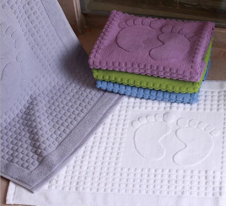 Custom thick hotel bath mat embossed jacquard logo cotton bath floor mat towel