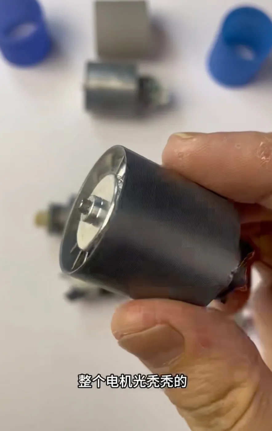 Unmarked electric motor sample with no visible model number or manufacturer identification on the outer casing.