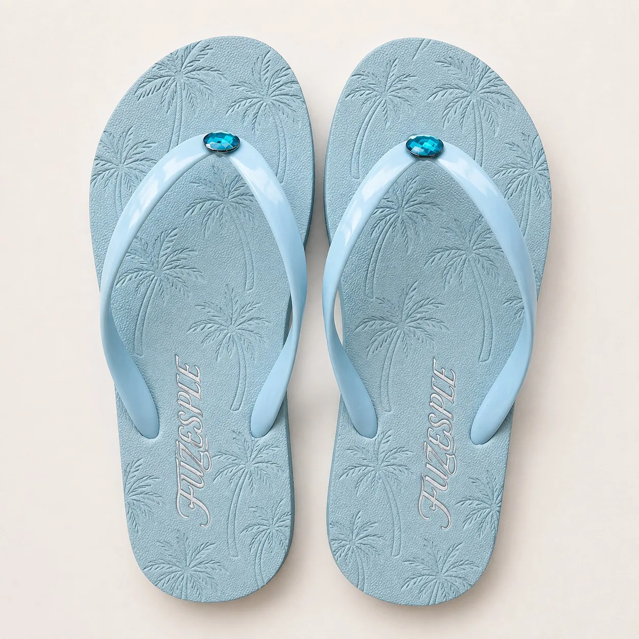 Light blue palm tree embossed gem flip flops
