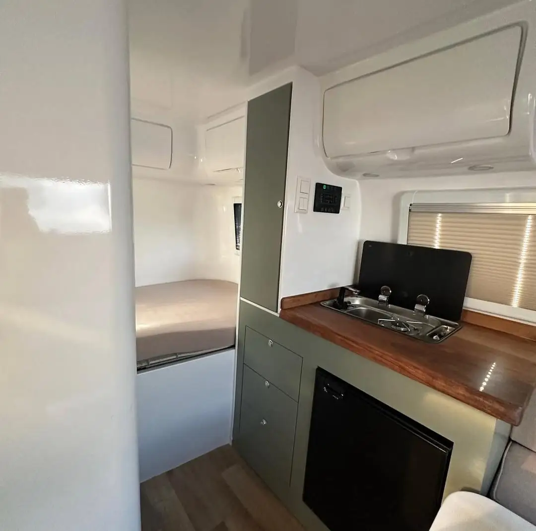 New Design High Class Modern Teardrop Travel Trailer Rose Color Wood Floor Stainless Steel 6 Person Sleeping Capacity