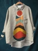 camicia beige con motivo gattino