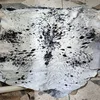 Black Spotted on White