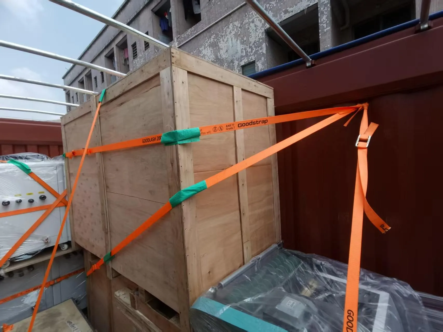 Custom mold wooden crate secured inside container