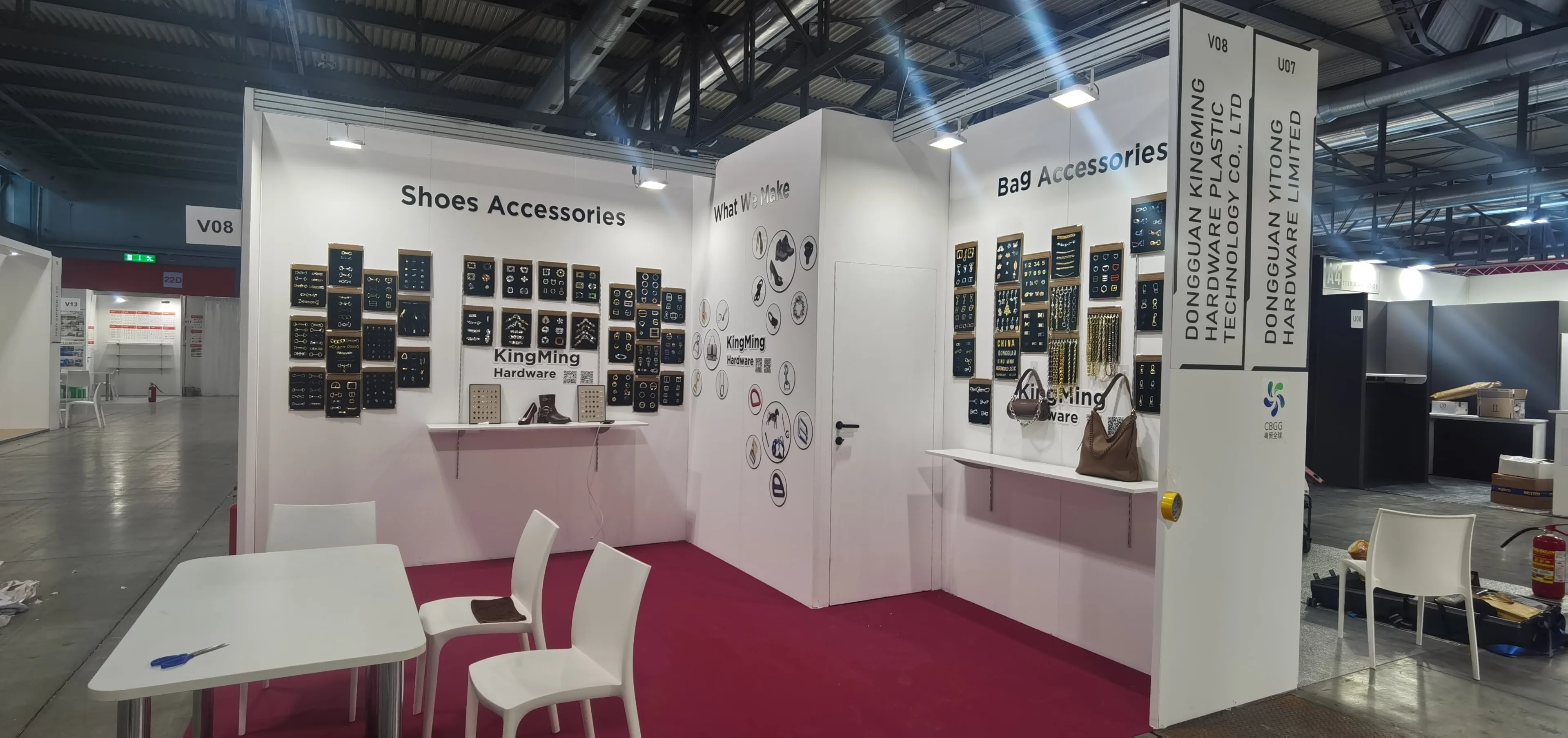 KingMing Hardware exhibition booth at a previous LINEAPELLE Milan fair, displaying shoe accessories and bag accessories hardware samples on wall panels