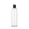 bottle with disc top cap