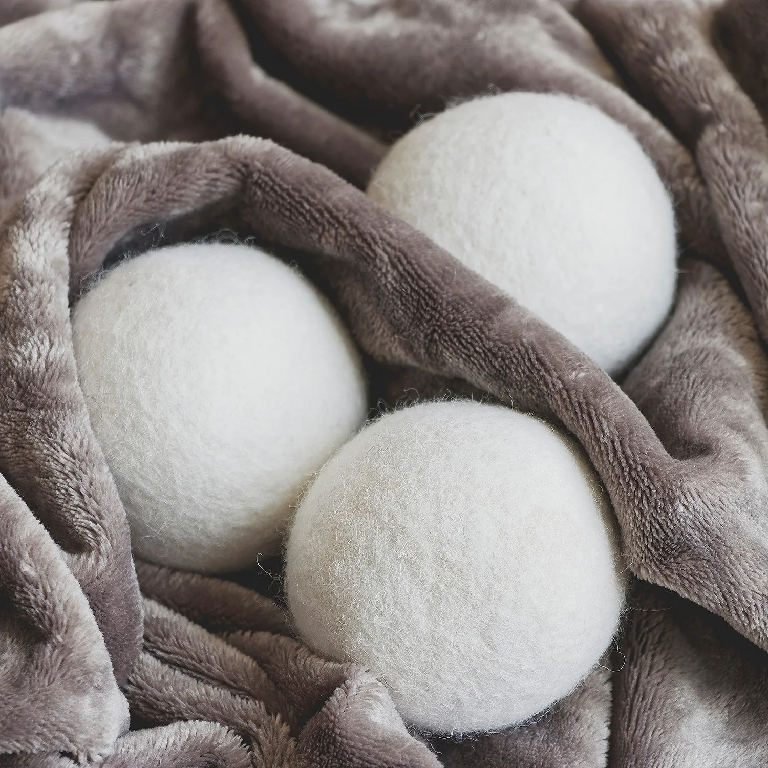 Soft Laundry Nestled with Wool Balls