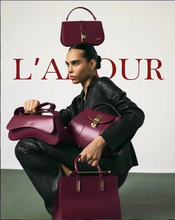Premium presentation of a burgundy custom leather handbag