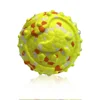Neon yellow base with white and orange dots