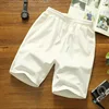 Pantalones cortos de malla blanca