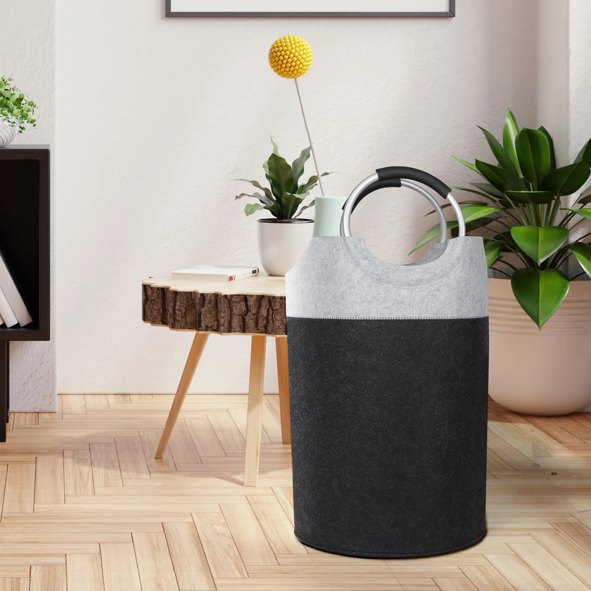 Black and grey felt laundry hamper in a stylish living room