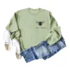 Olive green sweatshirt (black font) printed on the chest